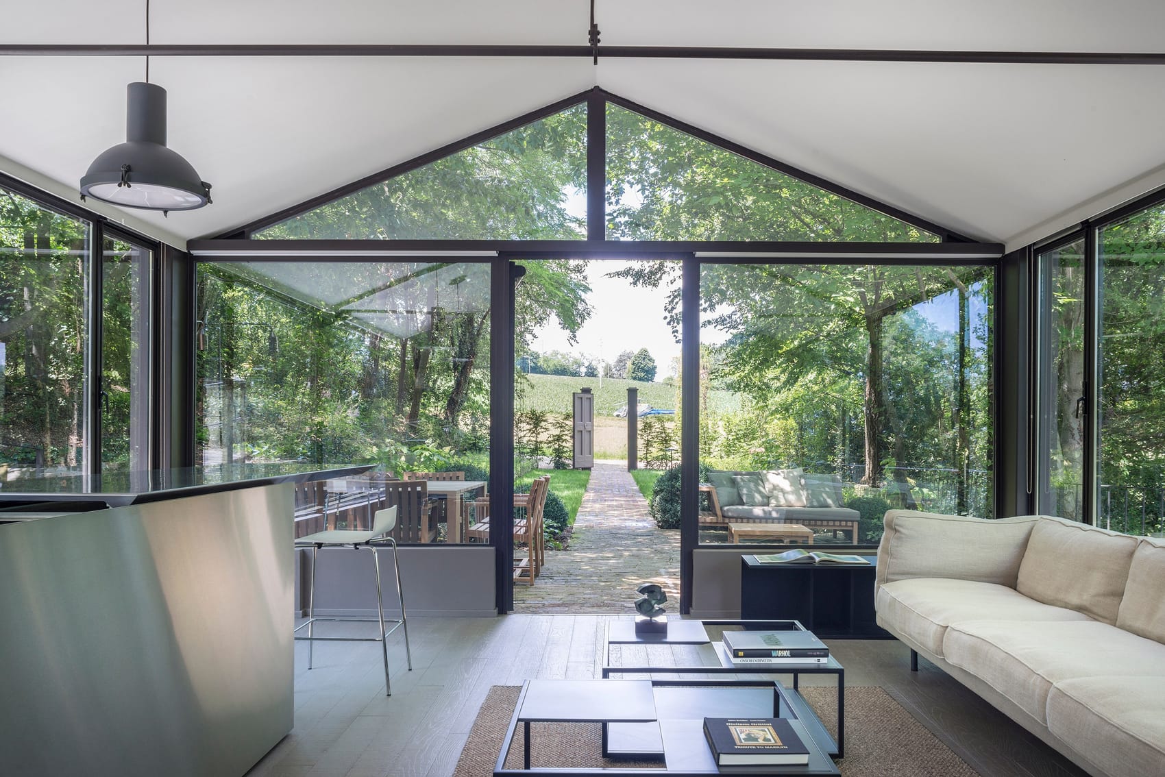 Glass garden room with floor-to-ceiling windows